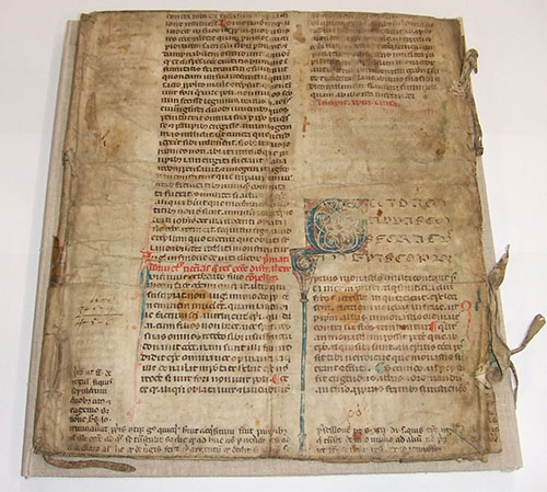 Medieval manuscript used as a cover for a later document.
