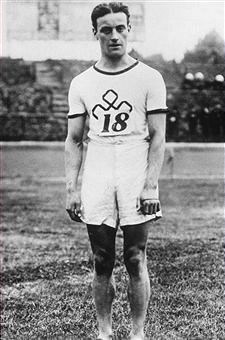 black and white photograph of white male athlete from 1913