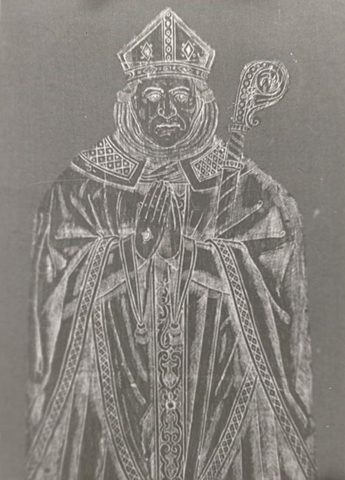 Brass rubbing of a sixteenth-century tomb of a man in bishop's robes and mitre.